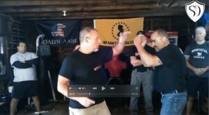 Self-defense instructor strike demonstration technique